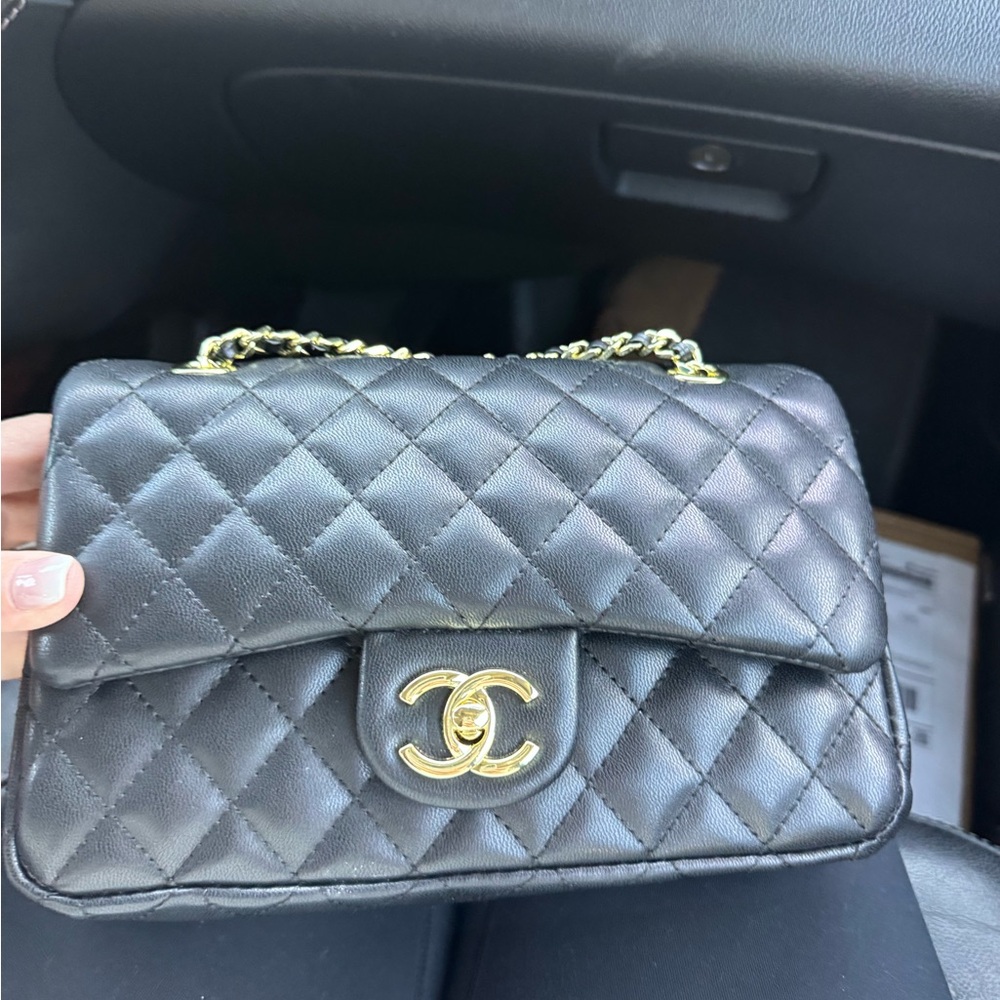 Elegant Black Quilted Shoulder Bag with Gold Details